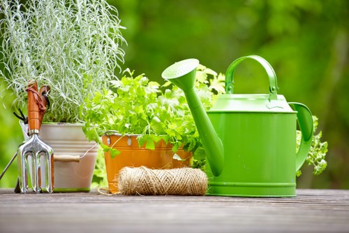 Eco-friendly hedge trimming practices in a lush Hammersmith garden
